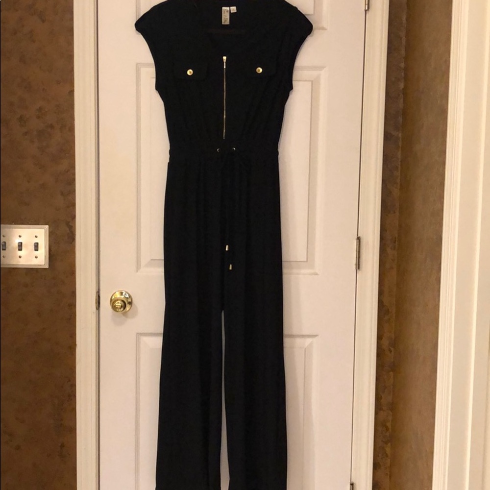 Jumpsuit black color with gold zipper and buttons